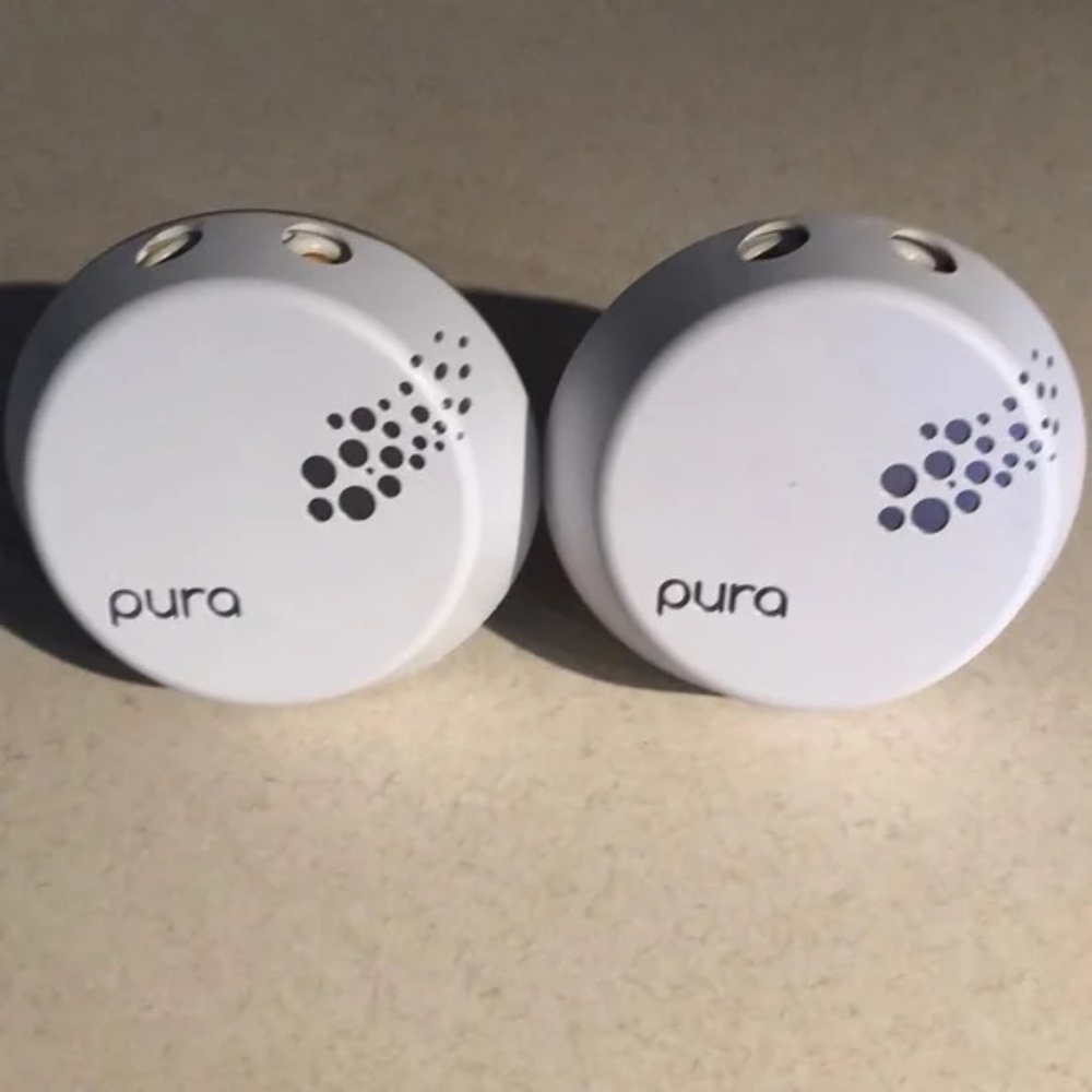 Two Pura Smart Diffusers